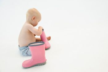boy with pink wellies